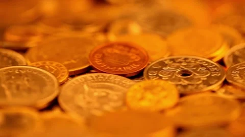 Dolly shot over various gold coins Saving Money and Gold - 4K Resolution Dolly Stock-Footage 334028690