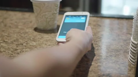 Dolly Shot Paying at Cafe with NFC Mobile Phone App Vidéo 63472659