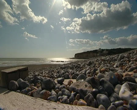Dolly shot pebbly beach Stock Footage 32528277