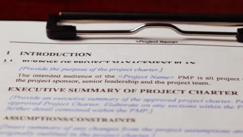 Dolly shot of project management important form document on table 2 Stock Footage 266084630