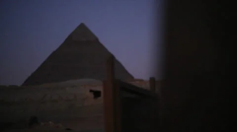 Dolly shot of pyramids plus sphinx at sunrise Stock Footage 26315504