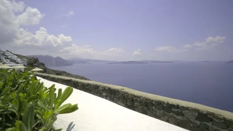 Dolly shot of a Santorini sidewalk path Stock Footage 84174545