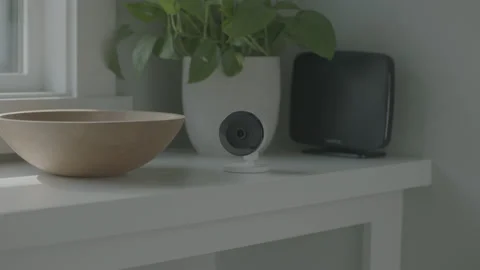 Dolly shot of a security camera in home Stock Footage 149133620