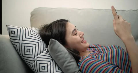 Dolly shot, Side view of young pretty woman smile with happiness 스톡 동영상 240701391