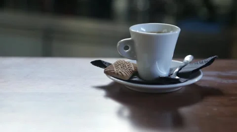 Dolly shot of single espesso at a bar Stock Footage 20535743