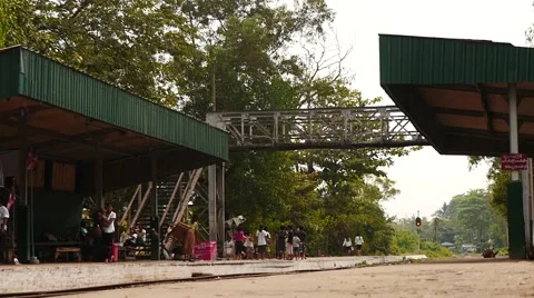 Dolly shot slow motion of train station in Myanmar near Yangon Stock Footage 61132196