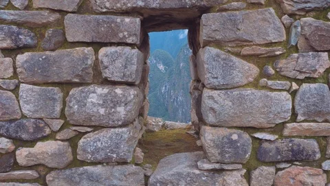 Dolly Shot through a window towards the mountains surrounding Machu Picchu Stock Footage 91402916