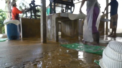 A dolly shot Transform process of rubber industry process to raw sheets Stock Footage 89995149