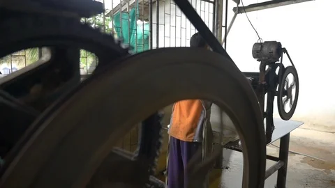 A dolly shot Transform process of rubber industry process to raw sheets Stock Footage 89995228