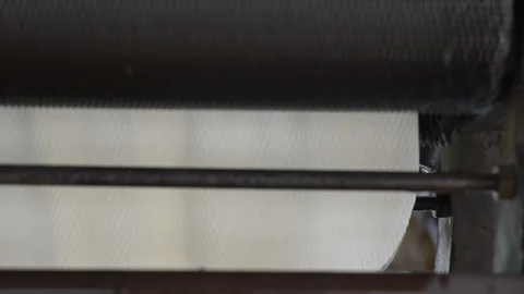 A dolly shot Transform process of rubber industry process to raw sheets Stock Footage 89995473