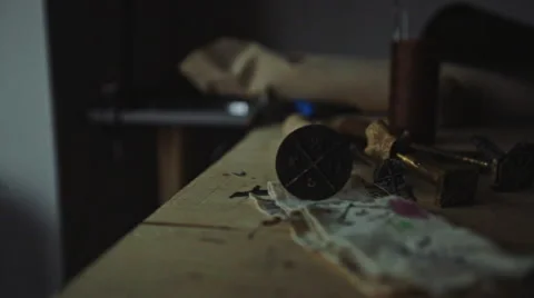 Dolly shot of various tools for crafting leather goods Stock Footage 61034027