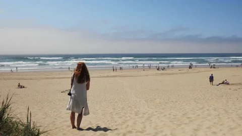 Dolly in through dunes on beach at west coast pacific ocean Stock Footage 143425167