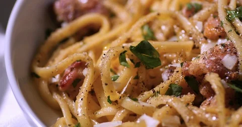 Dolly top down extreme close up view of a delicious plate of spaghetti carbonara Stock Footage 72949938