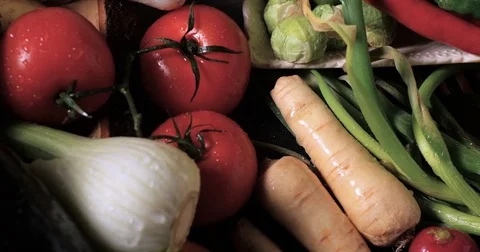 Dolly top down view of an assortment of fresh, healthy, organic vegetables Stock Footage 72619482