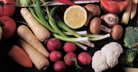 Dolly top down view of an assortment of fresh, healthy, organic vegetables Stock Footage 74066767