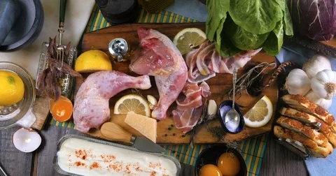 Dolly top down zoom in view of ingredients for a delicious Caesar's salad Stock Footage 76182512