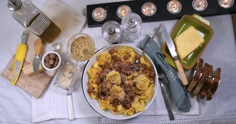 Dolly top down zoom in view of tortellini in bolognese sauce (pasta) Stock Footage 76444905
