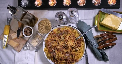 Dolly top down zoom in view of fettuccine in bolognese sauce (pasta) 動画素材 76444921