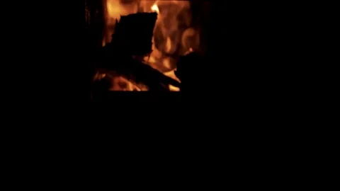 Dolly towards stove fire Stock Footage 71179077