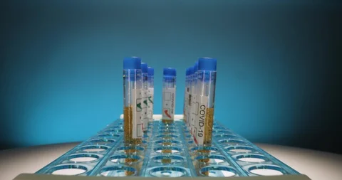 Dolly towards test tubes for COVID-19 coronavirus testing Stock Footage 127678577
