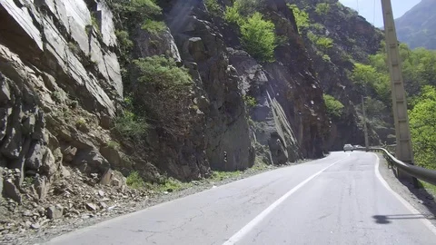 Dolly Tracking Pov Front Shot View Of Driving In a mountainous Country Road Stock Footage 97400683