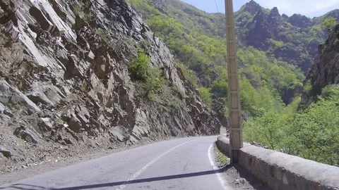 Dolly Tracking Pov Front Shot View Of Driving In a mountainous Country Road Stock Footage 97400885