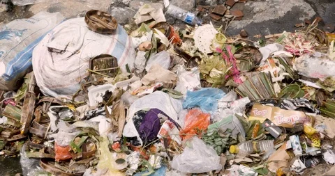 Dolly of trash dumped next to a river in Bali, Indonesia Stockbeeldmateriaal 87794601