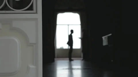 Dolly of two man talking in backlight Stock Footage 35898557