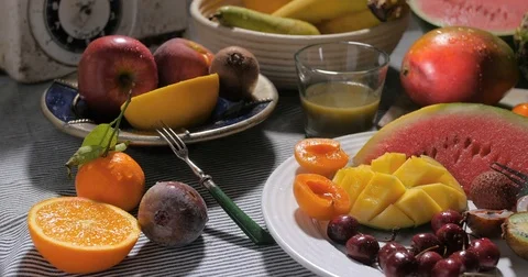 Dolly view of an assortment of fresh, healthy, organic fruits Stock Footage 71854336