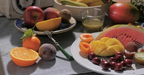 Dolly view of an assortment of fresh, healthy, organic fruits Stock Footage 72176728