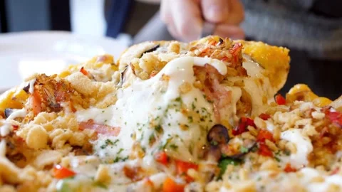 Dolly view of baking a pizza with hands taking slices and empty the plate stop Vídeos de archivo 336586636