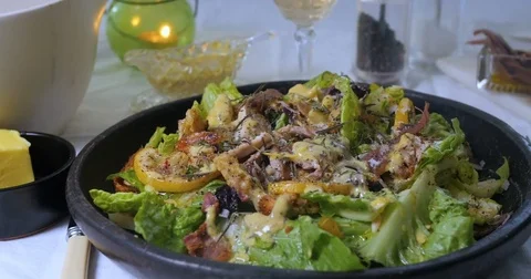 Dolly view of a delicious Caesar's salad Stock Footage 74571696