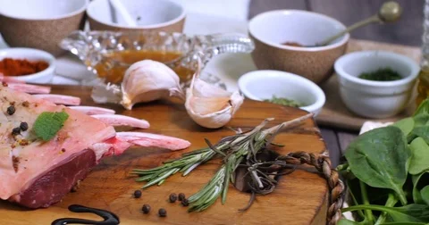 Dolly view of ingredients for minted rack of lamb Stock Footage 73526867