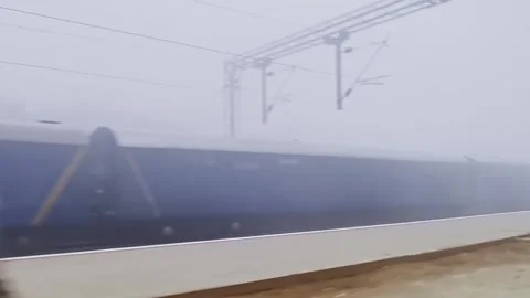 Dolly view from moving train through foggy landscape showing misty nature a.. 스톡 동영상 334793471