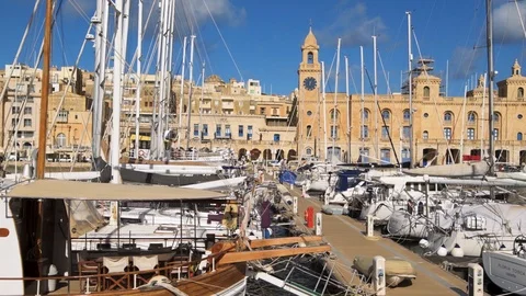Dolly view of the seafront of Vittoriosa (Birgu) in Malta Stock Footage 108730292
