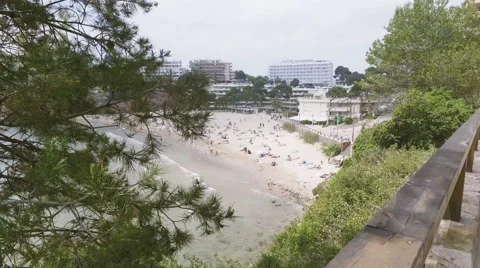 Dolly view of the sunny sand beach from above Stock Footage 63755860