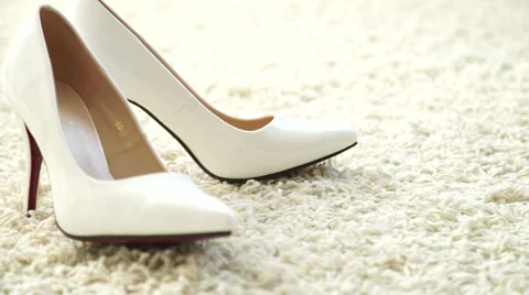 Dolly, white shoes on the mat 動画素材 55646540