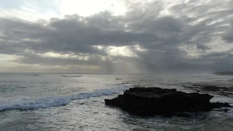 Dolly zoom cloudy sky ocean cliffs wave Stock Footage 303639022
