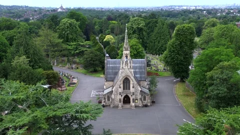 Dolly Zoom Effect on Gothic Chapel Surrounded by Lush Greenery Stock Footage 325839128