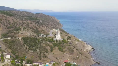 Dolly zoom. Malorechenskoe, Crimea. Temple-lighthouse of St. Mikoli the Stock Footage 164166340