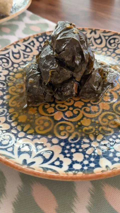 Dolma on a decorative ceramic plate captured as vertical format for food co.. Stock Footage 336208184