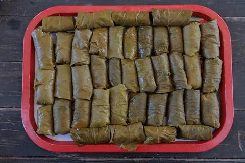 Dolma or sarma made from grape leaves lies 스톡 사진