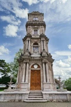 Dolmabahce Clock Tower, or Dolmabahce Saat Kulesi, situated outside Dolmab... Stock Photos