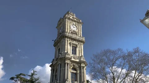 Dolmabahce Watch Tower view in cloudy day tilt shot Stock Footage 231963321