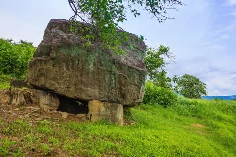 Dolmen on the grass. Stock Photos