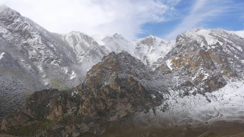 Dolomite rocks powdered with snow Stock Footage 83725257