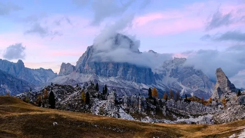 Dolomites Alps mountains at cloudy sunset. Italian Alps time lapse video Stock Footage 99453247