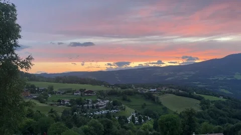 Dolomites – Golden Sunset Views Looking Out Over a Charming Alpine Town, South Stock Footage 336445077