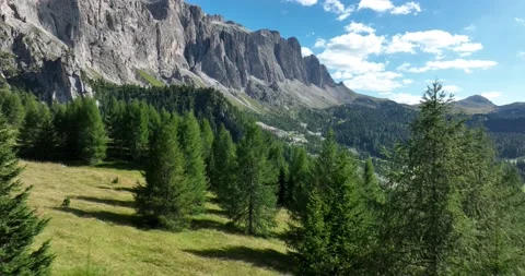Dolomites Italy mountain range holiday alps landscape clouds aerial cinematic Video stock 211069308