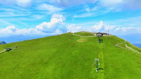 Dolomites - Mount Seceda. A green clearing with a precipice against the backdrop Video stock 283504239